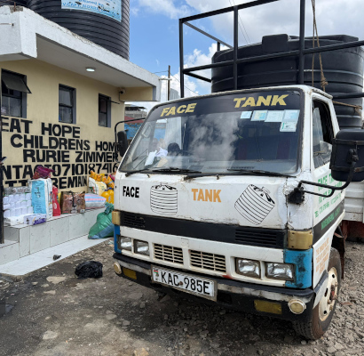Water tank donation Great Hope Zimmerman Rurie